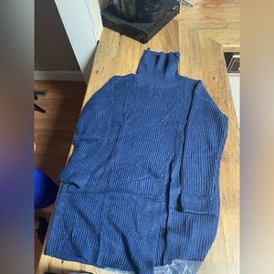 Blue turtleneck sweater with slit